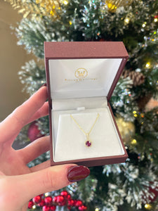 14k Yellow Gold Round Ruby and Diamond Halo Pendant