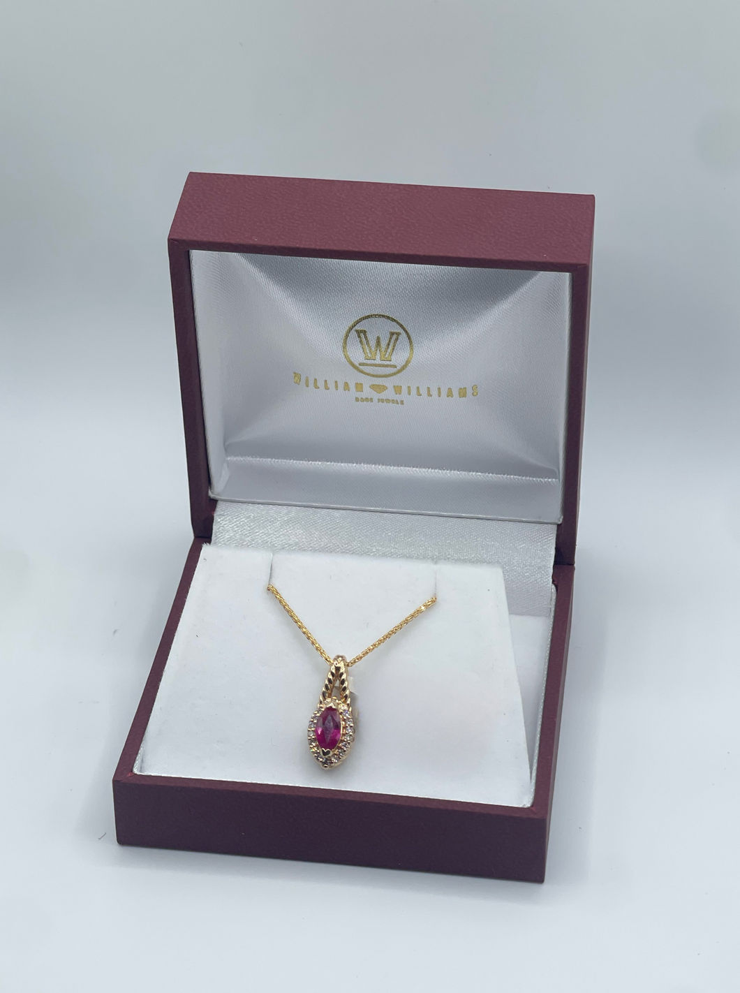 Ruby and Diamond Pendant in 14k Yellow Gold