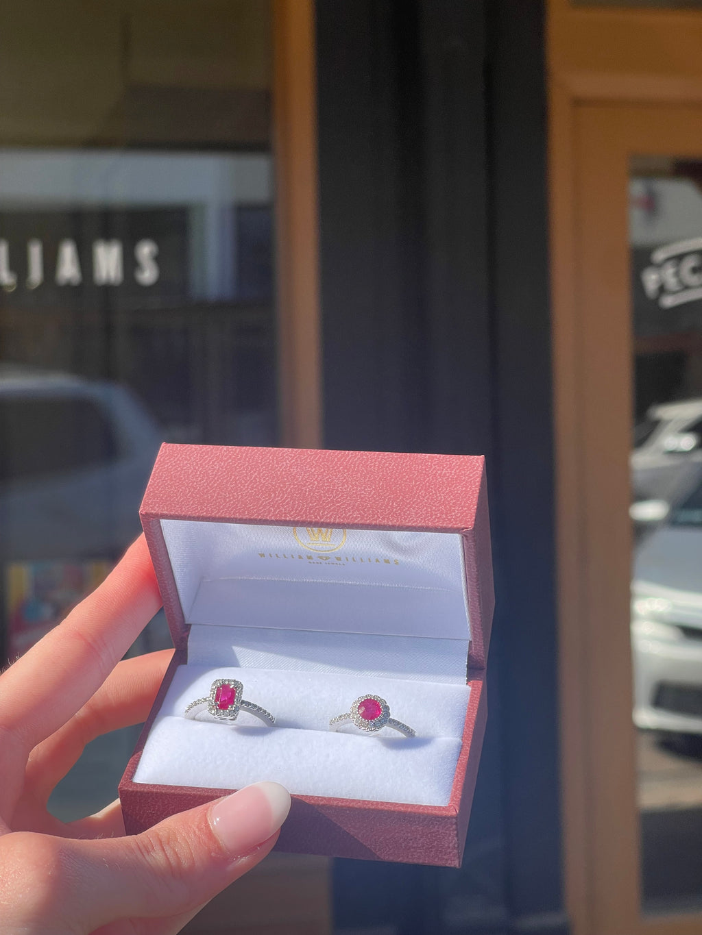 Exquisite 14k White Gold 0.75ct Emerald-Cut Ruby and 0.25ctw Diamond Halo Ring