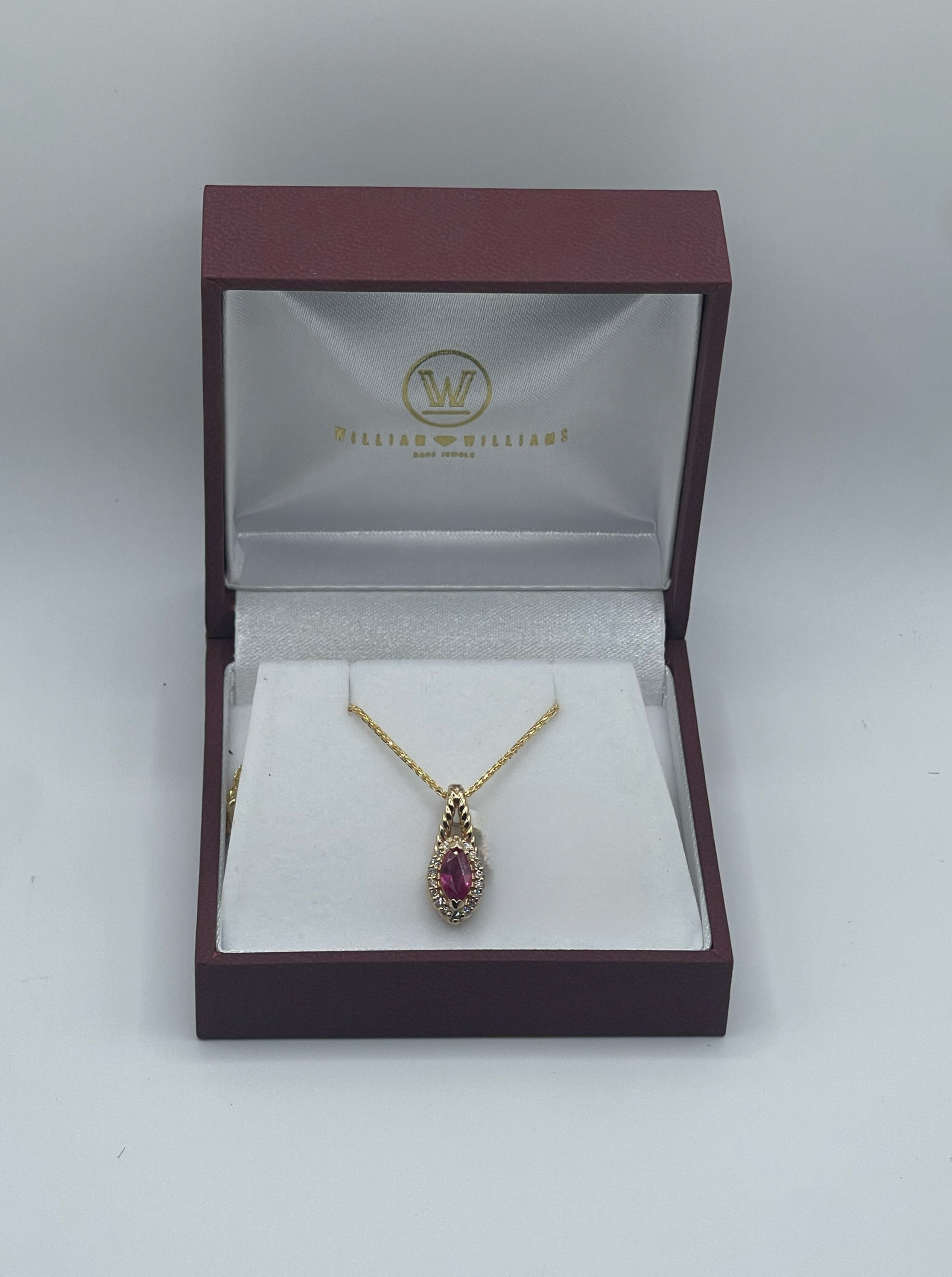Ruby and Diamond Pendant in 14k Yellow Gold