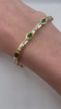 Load and play video in Gallery viewer, 14k Yellow Gold Diamond and Emerald Bracelet
