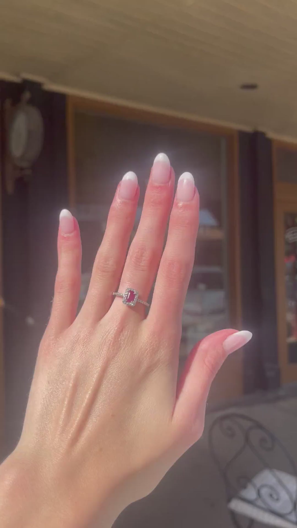 Exquisite 14k White Gold 0.75ct Emerald-Cut Ruby and 0.25ctw Diamond Halo Ring