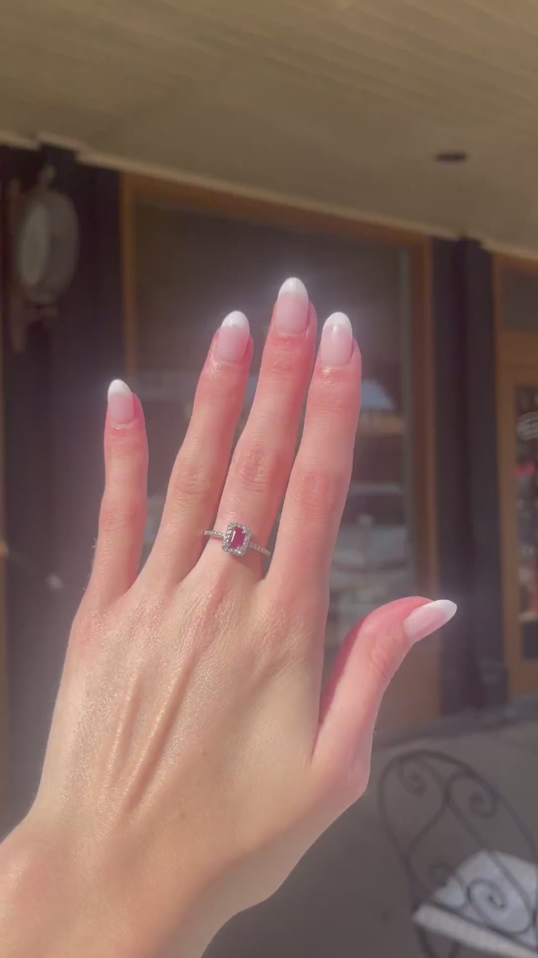 Exquisite 14k White Gold 0.75ct Emerald-Cut Ruby and 0.25ctw Diamond Halo Ring