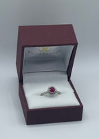 Luxurious 14k White Gold 0.75ct Round Ruby and 0.35ctw Diamond Halo Ring