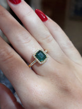 Load image into Gallery viewer, 18K Yellow Gold Emerald and Diamond Halo Ring
